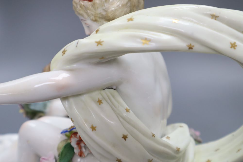 A Thuringian group of Venus and Cupid (some damage) and a Michael Sutty limited edition figure of an Art Deco style lady, tallest 33cm